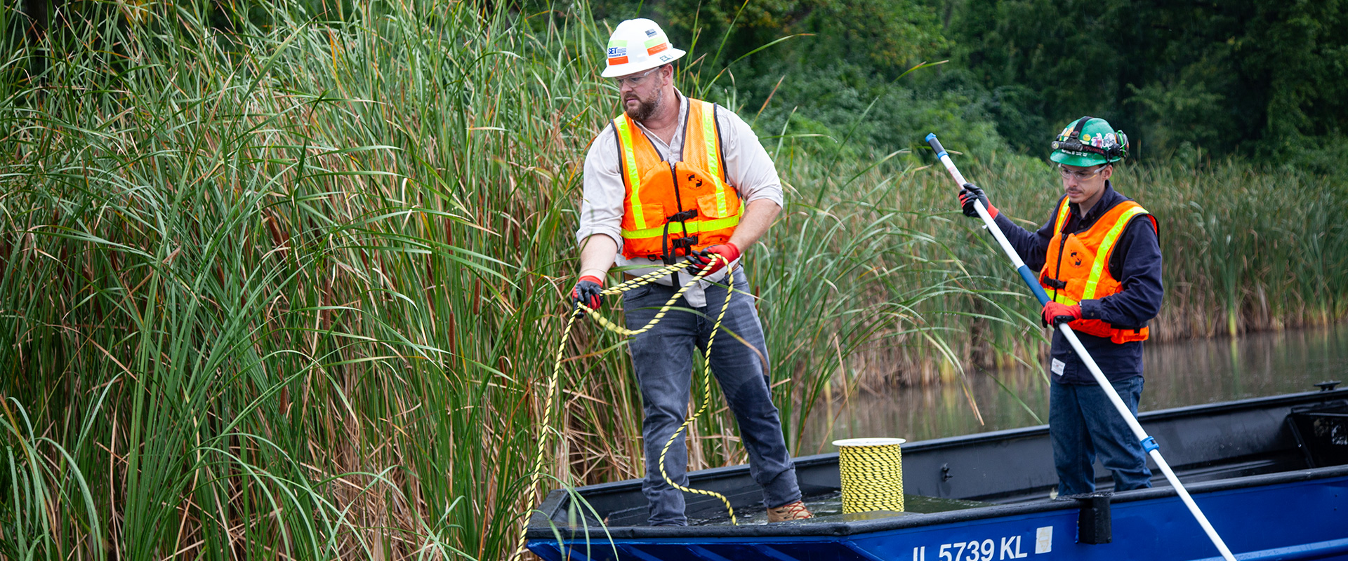 field service and emergency response workers in a boat