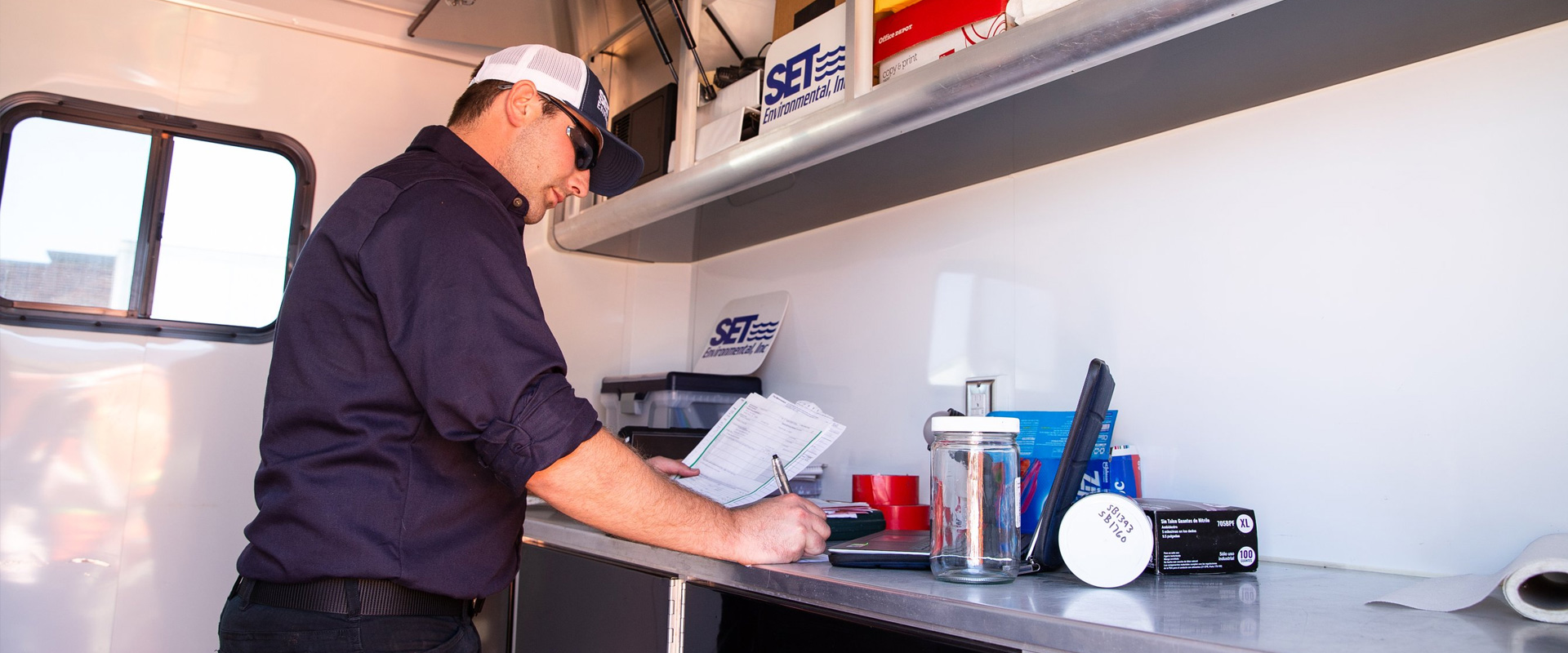 SET Environmental worker doing paperwork