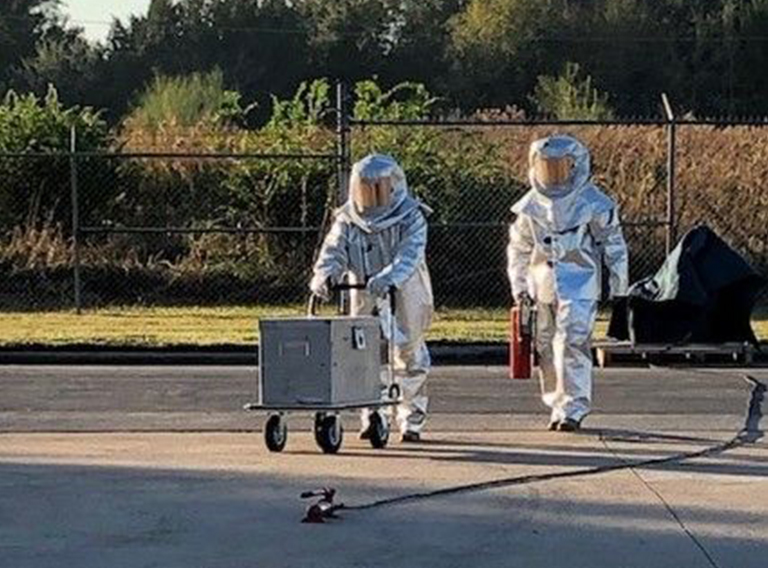 waste management workers in safety gear